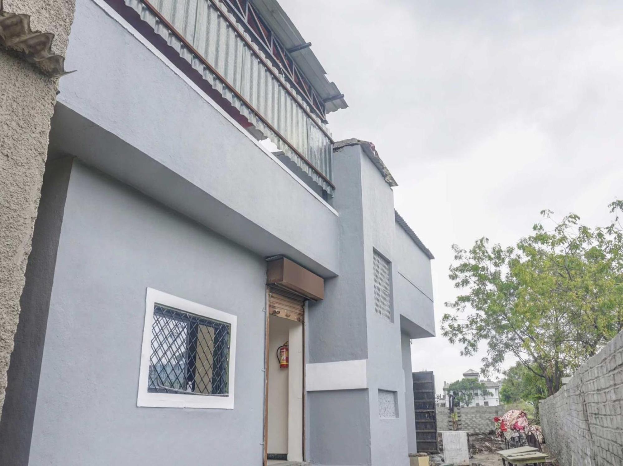 Spot On 74501 Hotel Supriya Garden Vagholi Exterior photo